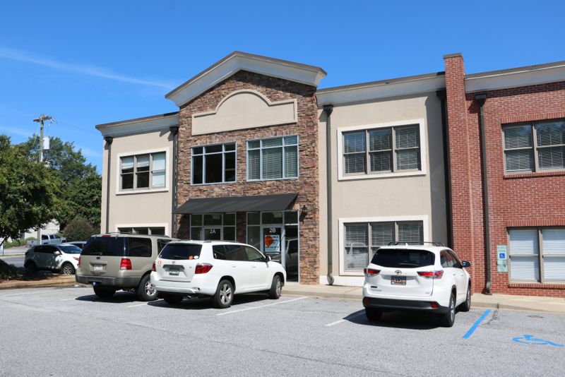 Precision Construction leases office space in Greer