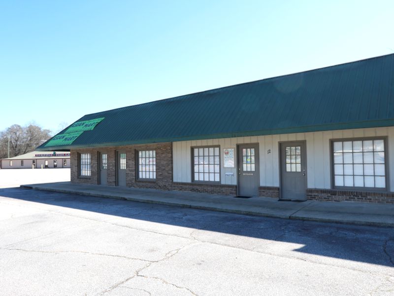 Unit leased in Country Plaza on E Wade Hampton Blvd.